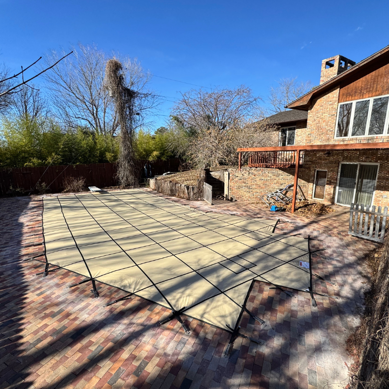 Pool cover strap down